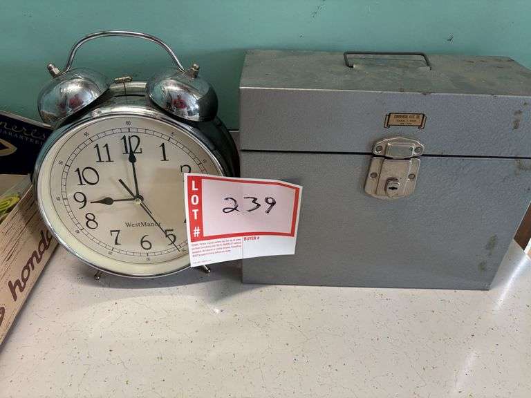 Clock and lockbox - Bonnigson & Associates