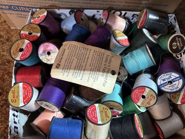 Spools with thread and patterns