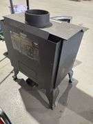 Iron woodstove, 22.5 x 21 x 29“