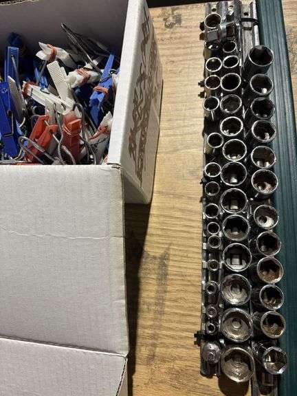 Electronic SOS, beacon, socket set, air horn, and clips