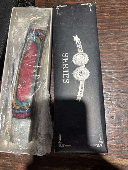 Hunting knife, folding knife, arrows, and camouflage paint