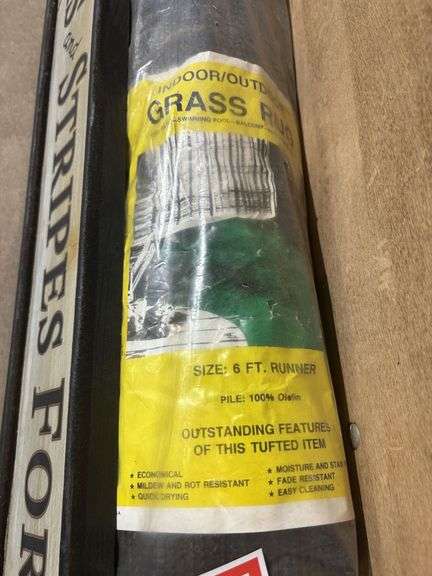 Stars and Stripes sign and indoor outdoor grass rug