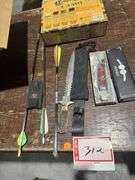 Hunting knife, folding knife, arrows, and camouflage paint