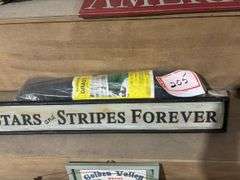 Stars and Stripes sign and indoor outdoor grass rug