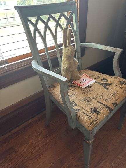 Armchair and stuffed rabbit toy