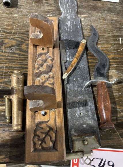 Serpentine knife, razor blade and strap, toy cannon and gun rack