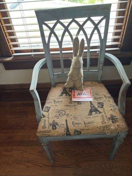 Armchair and stuffed rabbit toy