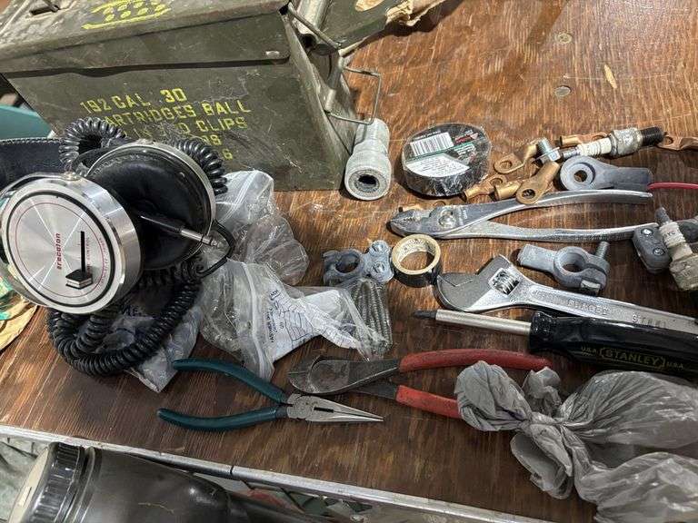 Assorted tools and headphones