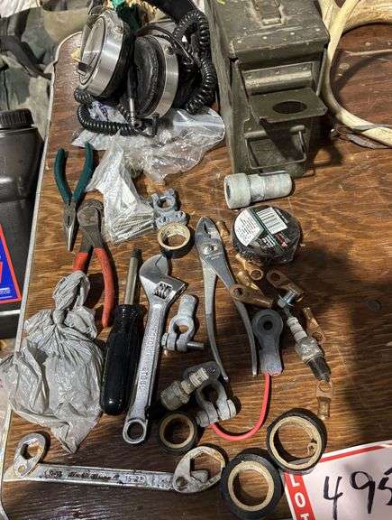 Assorted tools and headphones