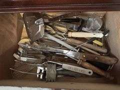 4 - drawers of silverware and other utensils