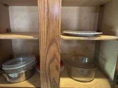Contents of above cupboards, Cookbook, glassware, mugs, etc.