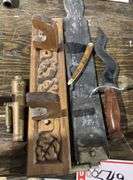 Serpentine knife, razor blade and strap, toy cannon and gun rack