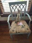 Armchair and stuffed rabbit toy