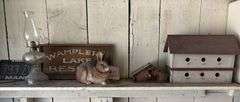 Oil lamp, rosin rabbit, sign, and Bird houses