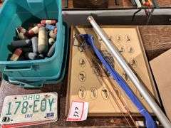 1.75 ounce fishing rod with aluminum container, duck picture, tote, and rope robbers