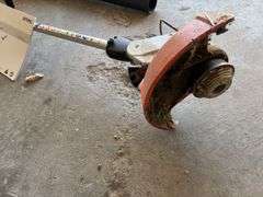 Stihl weed trimmer with battery and charger