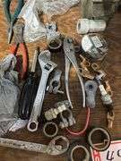 Assorted tools and headphones