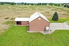 Tract 1 – 6.16 Acres Charming farmstead north of Mason Rd.
