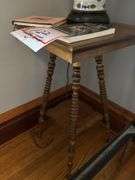 Table, lamp, 2 – pictures, book, 15 x 15 x 28.5”