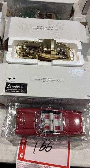 1936 Gold plated Chrysler Airflow, 1941 Packard Darrin Convertible, 1935 Golden Auburn, 1957 Cadilla