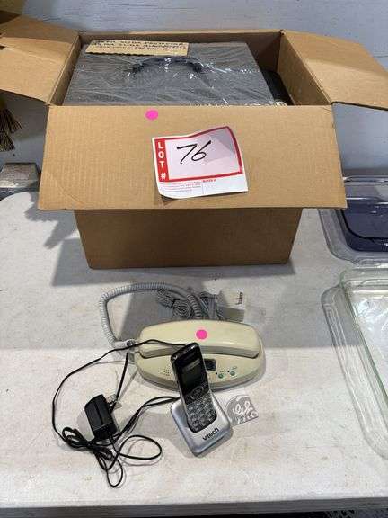 35 mm slide, projector and empty slide album, telephones