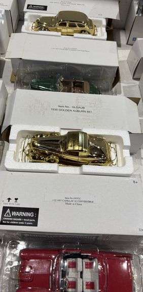 1936 Gold plated Chrysler Airflow, 1941 Packard Darrin Convertible, 1935 Golden Auburn, 1957 Cadilla