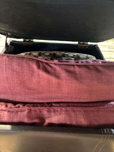 Battery charger, blanket, ottoman with pillow storage and pillow pillows
