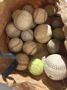 Backpacks, blanket, hats, baseballs, and softball