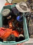 Backpacks, blanket, hats, baseballs, and softball