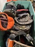 Backpacks, blanket, hats, baseballs, and softball