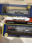 Southern Pacific, Illinois Central, Gravy Train engine, and 2 cars