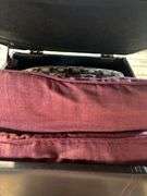 Battery charger, blanket, ottoman with pillow storage and pillow pillows
