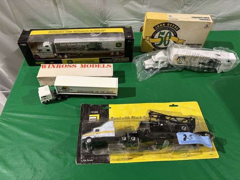 Peterbilt semi with trailer, semi with Black Beauty Interrogator, John Deere semi