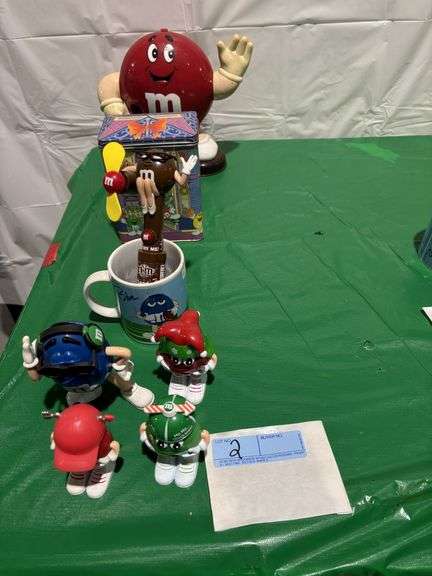 Mechanical M&M, mug and candy dispenser, tin