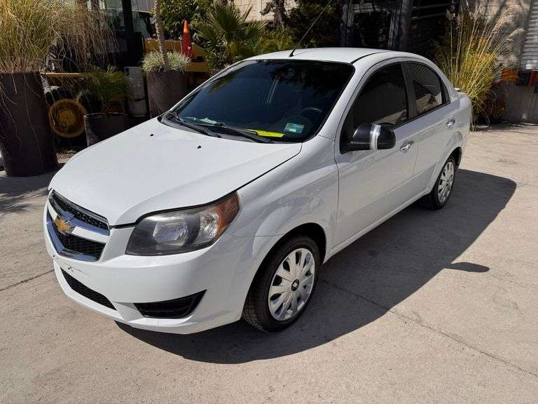 Vehículo usado, Chevrolet Aveo, motor 1.6 lts., 4 cilindros tipo: sedan, color: blanco, modelo: 2018