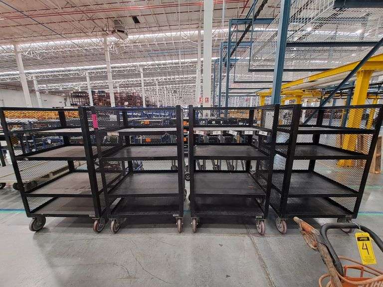 6 metal carts with 4 levels and mesh, with 8" wheels, measuring approximately 1.00 x 0.84 x 0.94 met