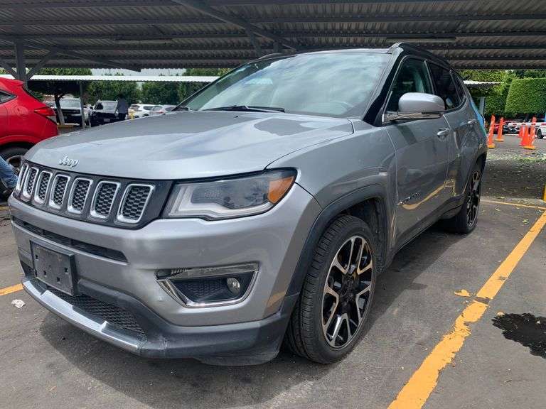 Vehículo usado marca JEEP COMPASS LIMITED, modelo 2021, color GRIS, No. de serie 3C4NJCCB7MT552864,