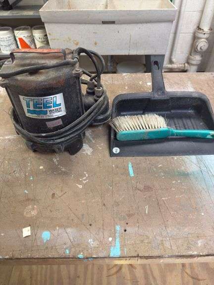 TEEL water systems pump, dust pan and dust broom.  Unknown condition of water system pump.