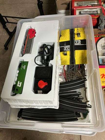 Bachmann Santa Fe Engine, Burlington Northern Car with Controller, Milwaukee Road Car, Union Pacific Car, Santa Fe Caboose, Like- Like Santa Fe Car, Life-Like Burlington Northern Car, Peabody Car, Life- Like Burlington Engine Life- Like Bangor and Aroostook, and Railroad Tracks