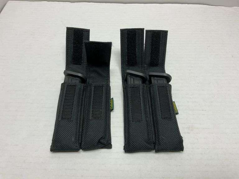2 nylon double mag pouches with 3 Sig Sauer 22lr magazines