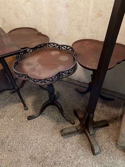 Garage hallway: Nice selection of vintage tables, also includes hall tree.