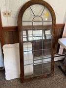 Family room: vintage parlor mirror with some spray paint, Leaded glass cabinet door, marble table top.