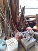 Barn: Contents of corner includes handtools, sockets, gas cans, vintage tools, trailer hitch components, lubricants. Take what you want and leave the rest