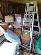 Contents of Right Garden Shed: clothing, Vintage furniture, vintage books, Glassware, shutters, hall tree, decorations, telephone chair, ladder, large lot - take what you want leave the rest.