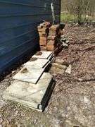 Lot includes two utility trailers, no certificate of origin, and some scrap. Also lot of brick, flat stone and lawn roller. Take what you want leave the rest