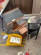 Family room: Child’s play desk, Ruff, vintage wheel barrel planter, smoke stand.