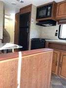 2013 Springdale 2600TB Camper.  Appears to have been parked for awhile.  Inspect at preview. Title in Documents