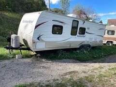 2013 Springdale 2600TB Camper.  Appears to have been parked for awhile.  Inspect at preview. Title in Documents