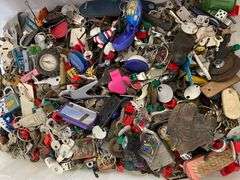 Large lot of very miscellaneous items. Keys. Accessories. Belt buckles. Film roll. Wallet. Decor. Vintage Christmas lights. Dice and much much more.