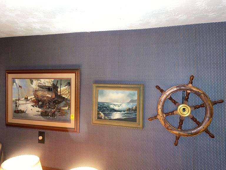 Den. Nautical decor. Featuring oil on canvas of shore. 35 x 22” print of ship and sleeping sailor. And 24 inch captains wheel.